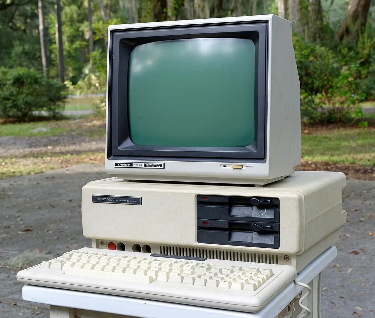 A Tandy 1000 computer with its monitor and keyboard
